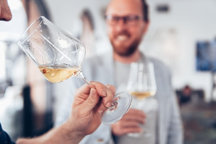 wine drinking and smiling people