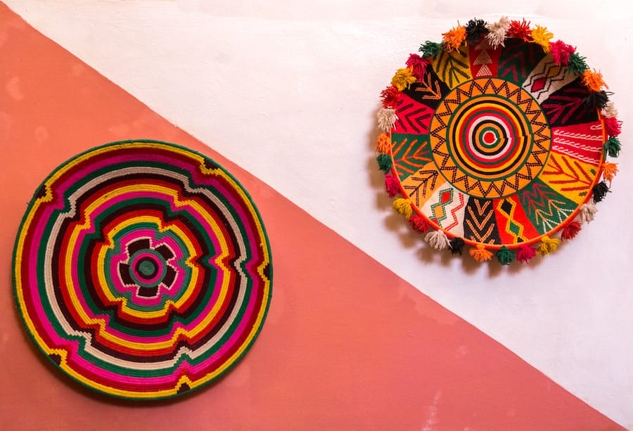 two woven pieces on a wall, demonstrating High-End Interior Design