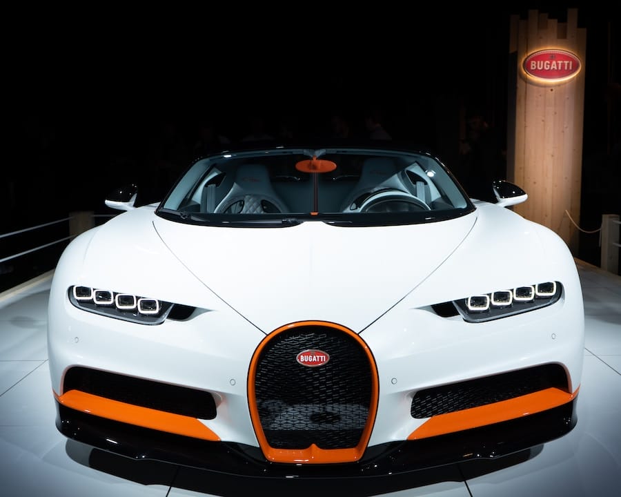 a showcase of a Ultra-Luxury Car indoors