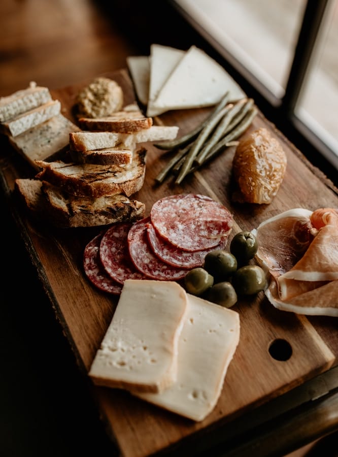 a charcuterie plate with Artisanal Cheese