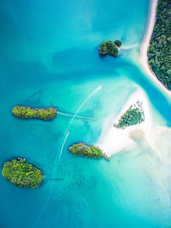 small tropical islands reached by yachts