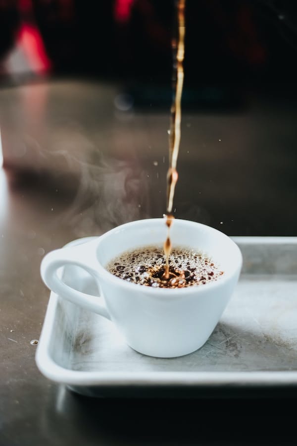 coffee flowing into a cup
