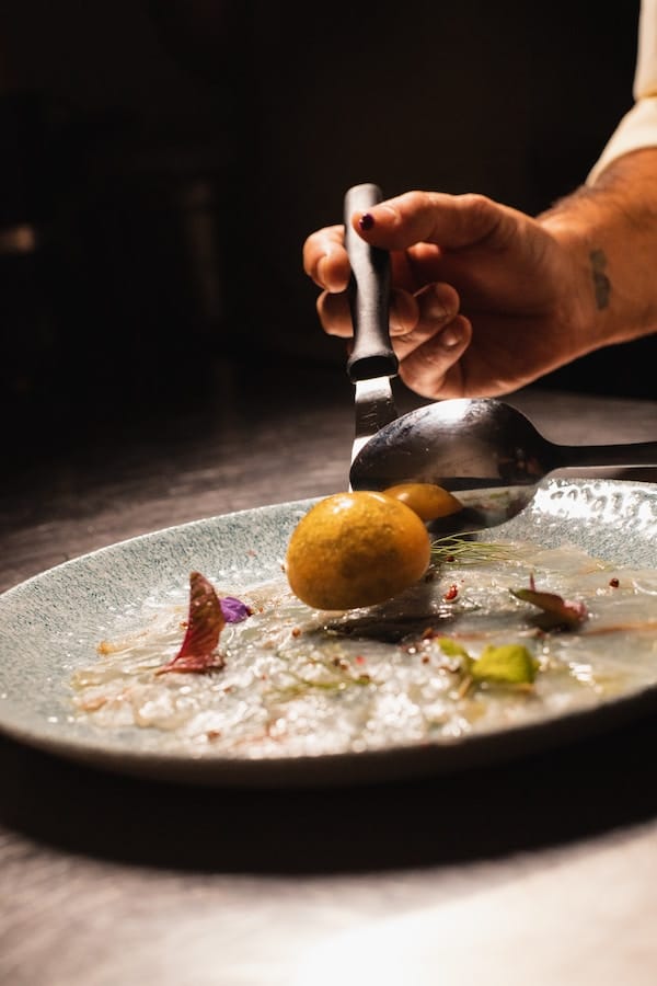 a plate of high-end fine-dining in a private island