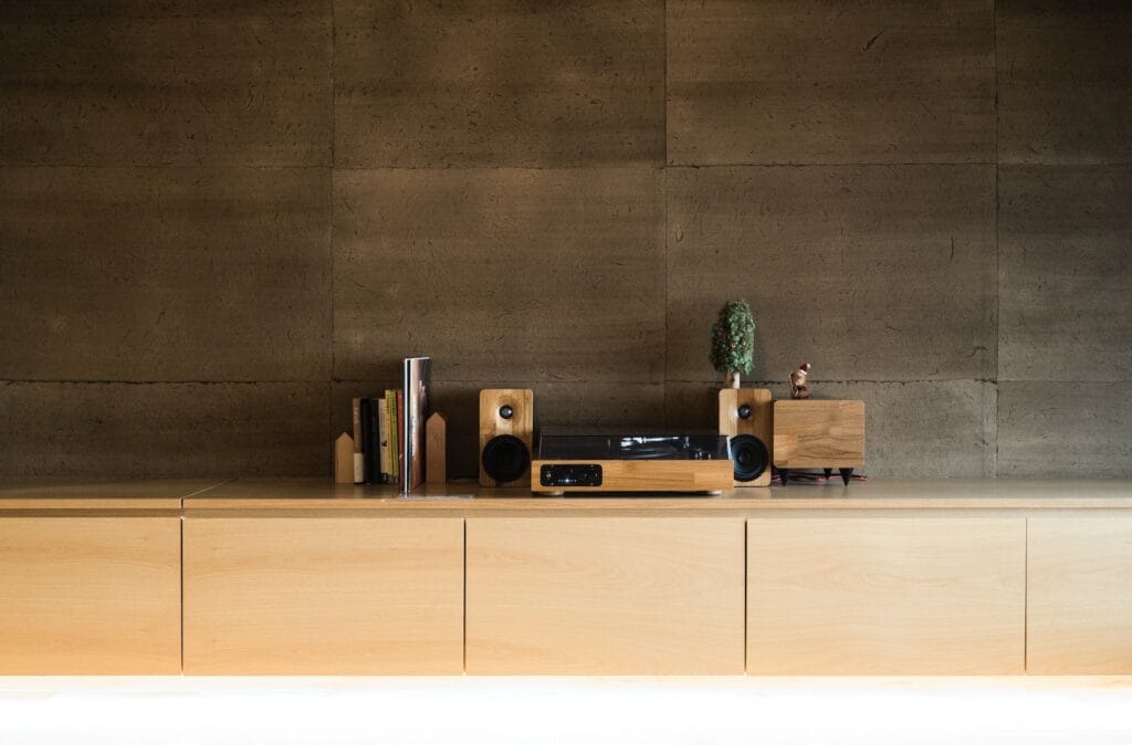 a wooden chest in the nordic style, demonstrating High-End Interior Design