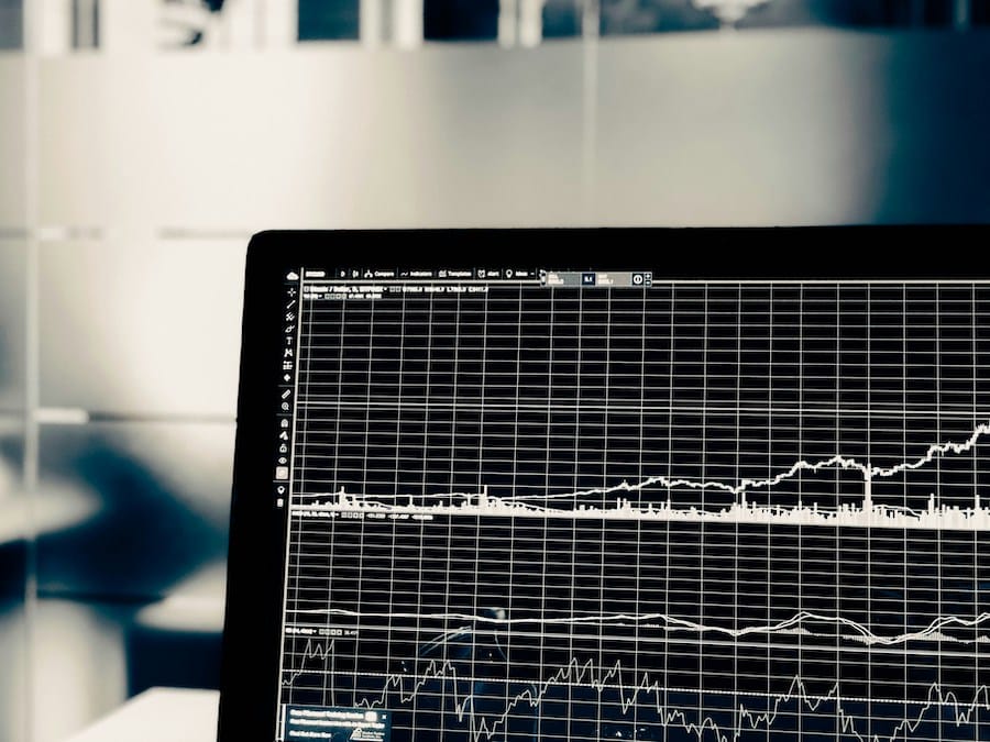 cryptocurrency buy-sell screen on a laptop